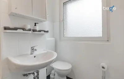 Ein Badezimmer in der Unterkunft BEGE APARTMENTS BusinessTranquil