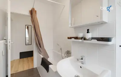 Ein Badezimmer in der Unterkunft BEGE APARTMENTS BusinessTranquil