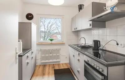 Küche/Küchenzeile in der Unterkunft BEGE APARTMENTS BusinessTranquil
