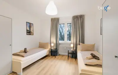 Ein Bett oder Betten in einem Zimmer der Unterkunft BEGE APARTMENTS BusinessTranquil
