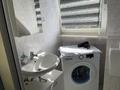 Ein Badezimmer in der Unterkunft POLAT Apartments 6