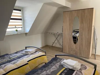 Ein Bett oder Betten in einem Zimmer der Unterkunft POLAT Apartments 6