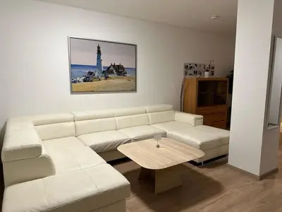 Ein Sitzbereich in der Unterkunft POLAT Apartments 8