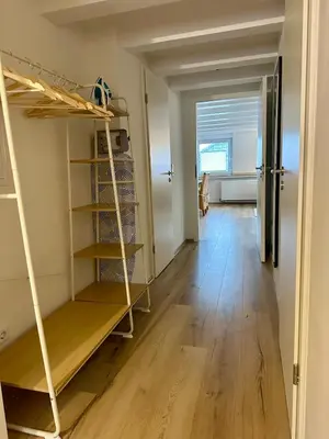 Ein Bett oder Betten in einem Zimmer der Unterkunft Helle 2-Zimmer Ferienwohnung mit 4 Betten, Nähe Innenstadt in ruhiger Lage