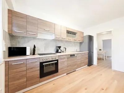 Küche/Küchenzeile in der Unterkunft Tolstov Apartments - 3 Room Apartment - Kitchen - Dining Area - 25 min Messe DUS