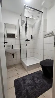 Ein Badezimmer in der Unterkunft Hotel Essen mit Apartments