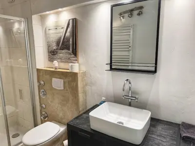 Ein Badezimmer in der Unterkunft 3 Zimmer Wohnung mit Garten