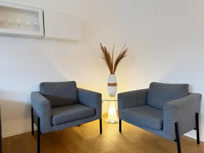 Ein Sitzbereich in der Unterkunft 3 Zimmer Wohnung mit Garten
