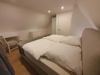 Ein Bett oder Betten in einem Zimmer der Unterkunft Infinity Homes Essen Kettwig