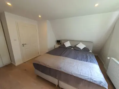 Ein Bett oder Betten in einem Zimmer der Unterkunft Infinity Homes Essen Kettwig