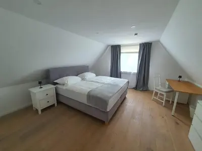 Ein Bett oder Betten in einem Zimmer der Unterkunft Infinity Homes Essen Kettwig