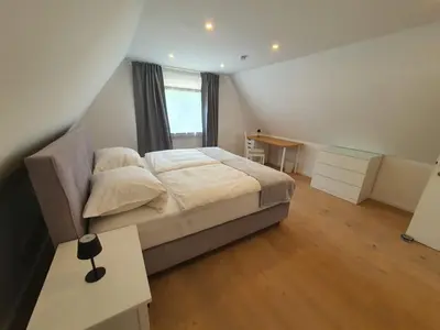 Ein Bett oder Betten in einem Zimmer der Unterkunft Infinity Homes Essen Kettwig