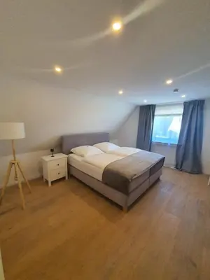 Ein Bett oder Betten in einem Zimmer der Unterkunft Infinity Homes Essen Kettwig