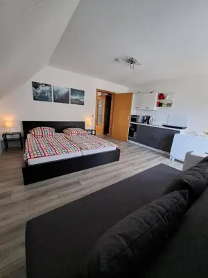 Ein Bett oder Betten in einem Zimmer der Unterkunft Appartement in ruhiger Lage