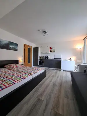 Ein Bett oder Betten in einem Zimmer der Unterkunft Appartement in ruhiger Lage