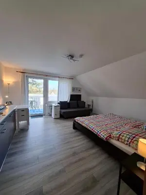 Ein Bett oder Betten in einem Zimmer der Unterkunft Appartement in ruhiger Lage