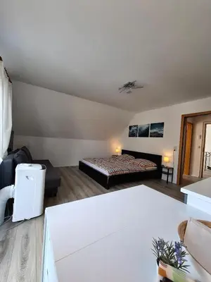 Ein Bett oder Betten in einem Zimmer der Unterkunft Appartement in ruhiger Lage