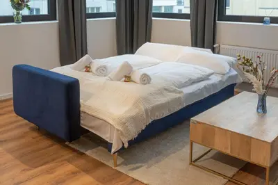Ein Bett oder Betten in einem Zimmer der Unterkunft Stilvoll & zentral in der Innenstadt, nahe Hauptbahnhof und Limbecker Platz, helle und großzügige Räume, voll ausgestattete Küche
