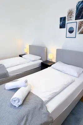 Ein Bett oder Betten in einem Zimmer der Unterkunft Stilvoll & zentral in der Innenstadt, nahe Hauptbahnhof und Limbecker Platz, helle und großzügige Räume, voll ausgestattete Küche
