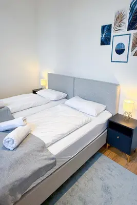 Ein Bett oder Betten in einem Zimmer der Unterkunft Stilvoll & zentral in der Innenstadt, nahe Hauptbahnhof und Limbecker Platz, helle und großzügige Räume, voll ausgestattete Küche