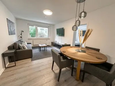 TV/Unterhaltungsangebot in der Unterkunft City Apartments Essen for up to 6 person with 4K TV and kitchen