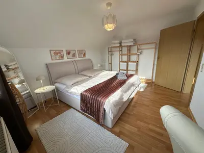 Ein Bett oder Betten in einem Zimmer der Unterkunft Weitblick Neviges