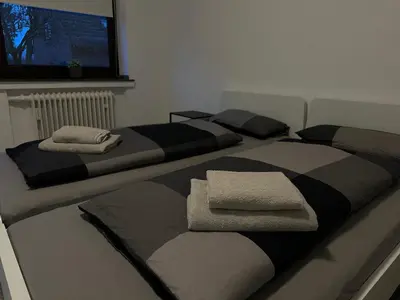 Ein Bett oder Betten in einem Zimmer der Unterkunft areahome