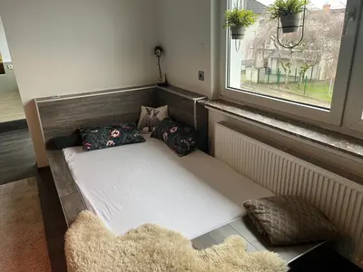 Ein Bett oder Betten in einem Zimmer der Unterkunft Sonnenblick Apartment sunview #rain-shower 2P bathtube BIG kitchen