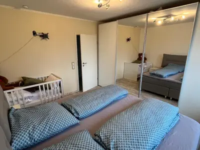 Ein Bett oder Betten in einem Zimmer der Unterkunft Sonnenblick Apartment sunview #rain-shower 2P bathtube BIG kitchen