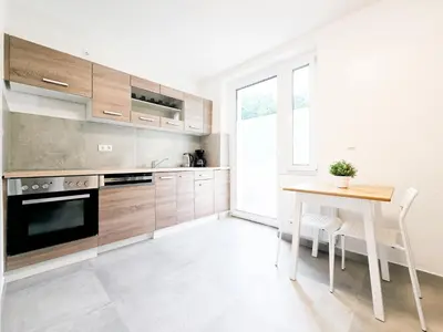 Küche/Küchenzeile in der Unterkunft Tolstov Apartments - Monteurwohnungen mit 3 Zimmern , Balkon und Parkplatz