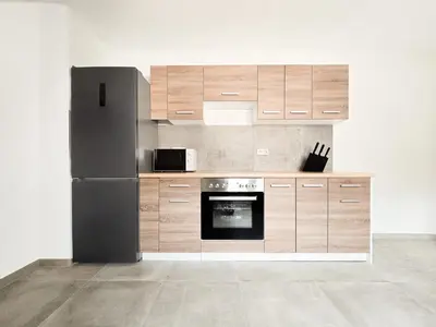 Küche/Küchenzeile in der Unterkunft Tolstov Apartments - Monteurwohnung mit 3 Zimmern - Dachgeschoss - Parkplatz