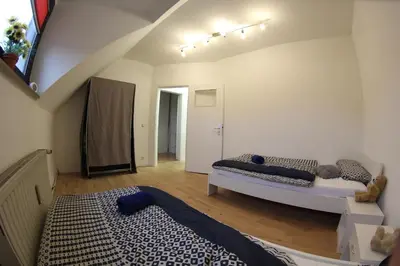 Ein Bett oder Betten in einem Zimmer der Unterkunft Ferienwohnung Kaue