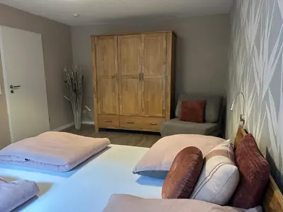 Ein Bett oder Betten in einem Zimmer der Unterkunft Ferienwohnung mit Infrarotsauna