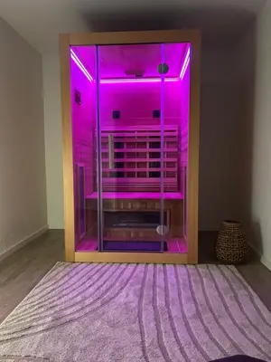 Ein Bett oder Betten in einem Zimmer der Unterkunft Ferienwohnung mit Infrarotsauna