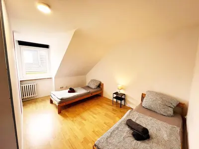 Ein Bett oder Betten in einem Zimmer der Unterkunft homes of ruhr - Monteurwohnung Hütte
