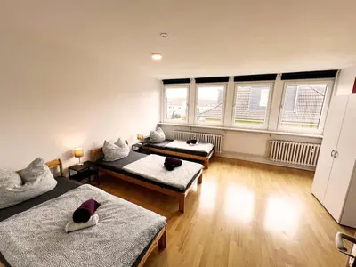 Ein Bett oder Betten in einem Zimmer der Unterkunft homes of ruhr - Monteurwohnung Hütte