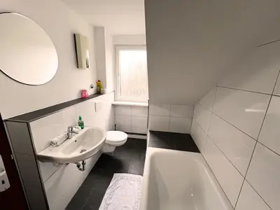 Ein Badezimmer in der Unterkunft homes of ruhr - Monteurwohnung Hütte