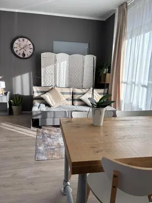 Ein Sitzbereich in der Unterkunft Authentic Travellers Suite in ehemaliger Gärtnerei