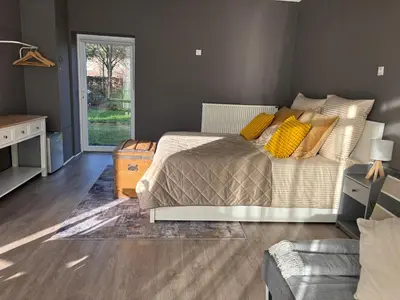 Ein Sitzbereich in der Unterkunft Authentic Travellers Suite in ehemaliger Gärtnerei