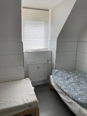 Ein Bett oder Betten in einem Zimmer der Unterkunft Apartment in Marl