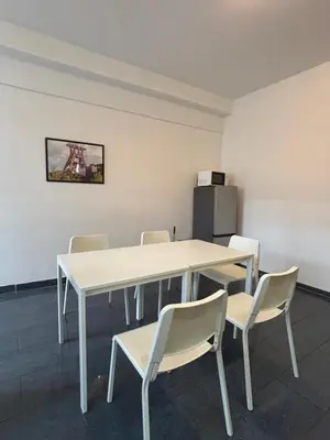 Grundriss der Unterkunft Case Four Boardinghouse mit Parkplatz, Küche, Waschmaschine und Trockner