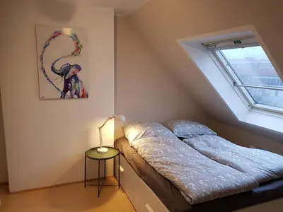 Ein Bett oder Betten in einem Zimmer der Unterkunft Charming maisonette with sun terrace