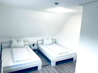 Ein Bett oder Betten in einem Zimmer der Unterkunft Wohnung mit neuem Bad und Küche