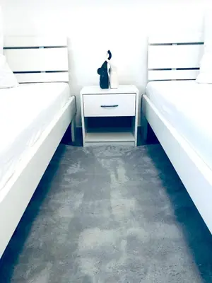 Ein Bett oder Betten in einem Zimmer der Unterkunft Wohnung mit neuem Bad und Küche