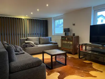 TV/Unterhaltungsangebot in der Unterkunft Moderne Wohnung mit offenem Wohnkonzept - Hagen Emst