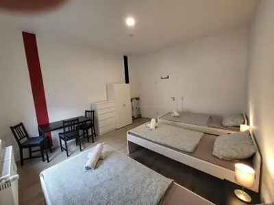 Ein Bett oder Betten in einem Zimmer der Unterkunft homes of ruhr - Monteurwohnung Hammer