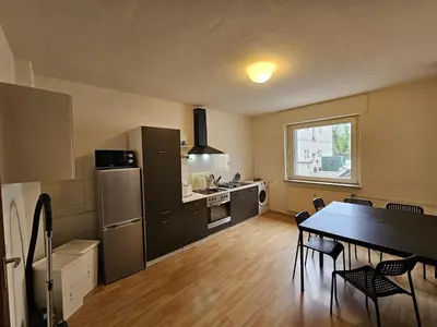 Küche/Küchenzeile in der Unterkunft homes of ruhr - Monteurwohnung Arena