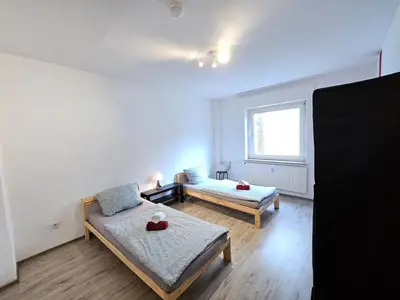 Ein Bett oder Betten in einem Zimmer der Unterkunft homes of ruhr - Monteurwohnung Schranke