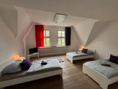 Ein Bett oder Betten in einem Zimmer der Unterkunft homes of ruhr - Monteurwohnung Grillo