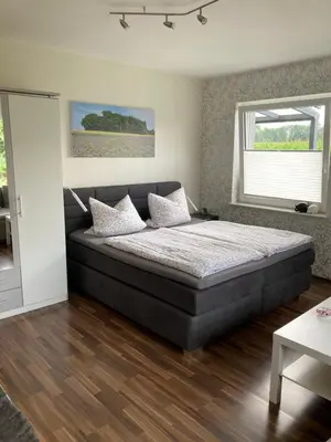 Ein Bett oder Betten in einem Zimmer der Unterkunft Ferienwohnung - Monteurwohnung